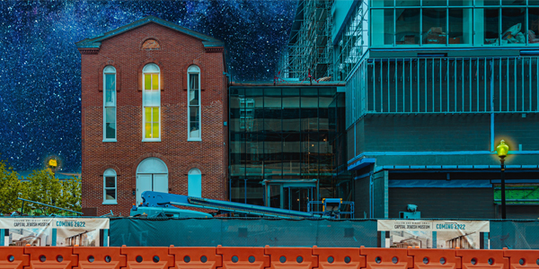Exterior view of the Capital Jewish Museum construction site at night as seen from 3rd Street, NW, May 2022.