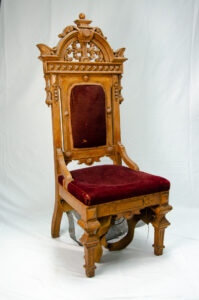 Bimah chair, with visible disrepair, from Talmud Torah synagogue. Capital Jewish Museum collection. Gift of Ohev Sholom - The National Synagogue.