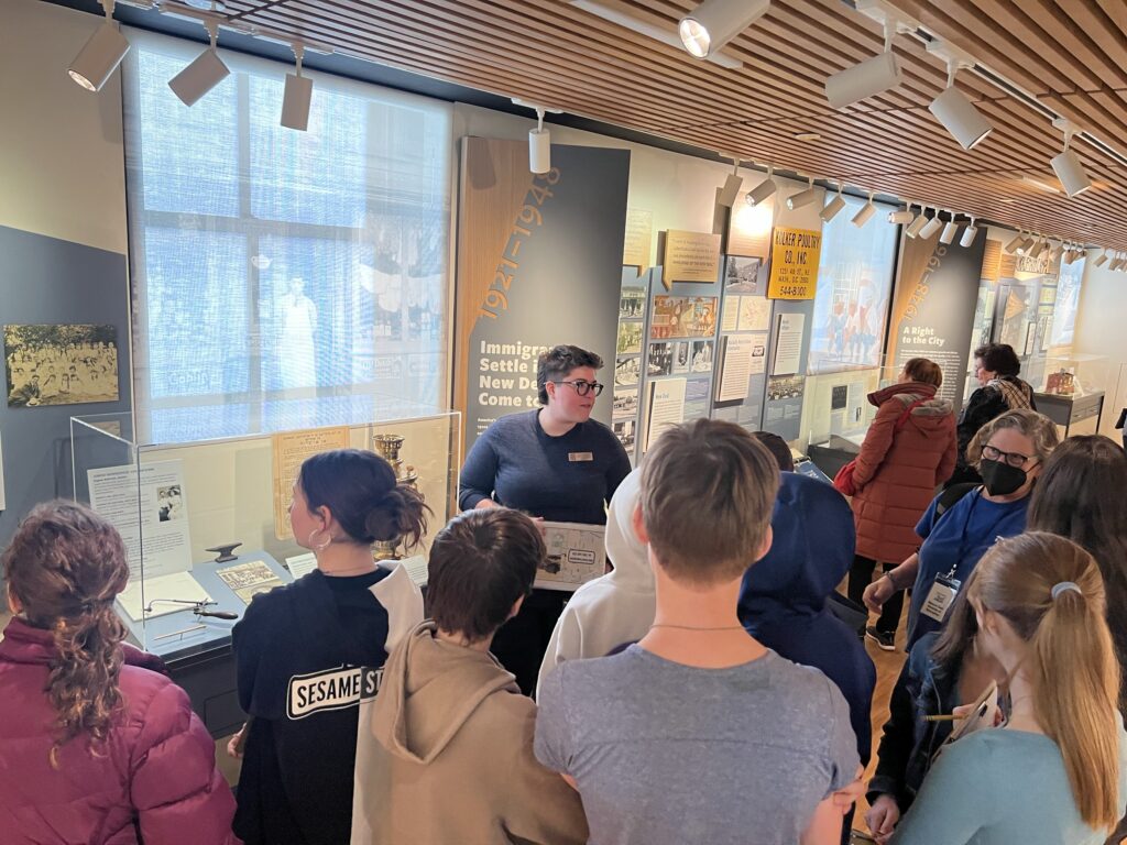 Students on a tour of the exhibition "What is Jewish Washington?." Fall 2023.