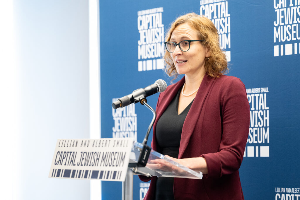 Dr. Beatrice Gurwitz, executive director of the Capital Jewish Museum, delivers remarks at the May 29, 2025, reopening ceremony. Photo courtesy of the Lillian and Albert Small Capital Jewish Musuem | Chris Ferenzi Photography