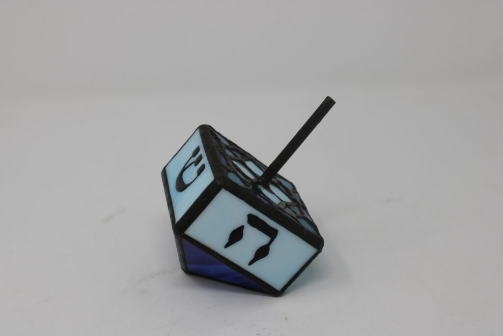 A light blue dreidel